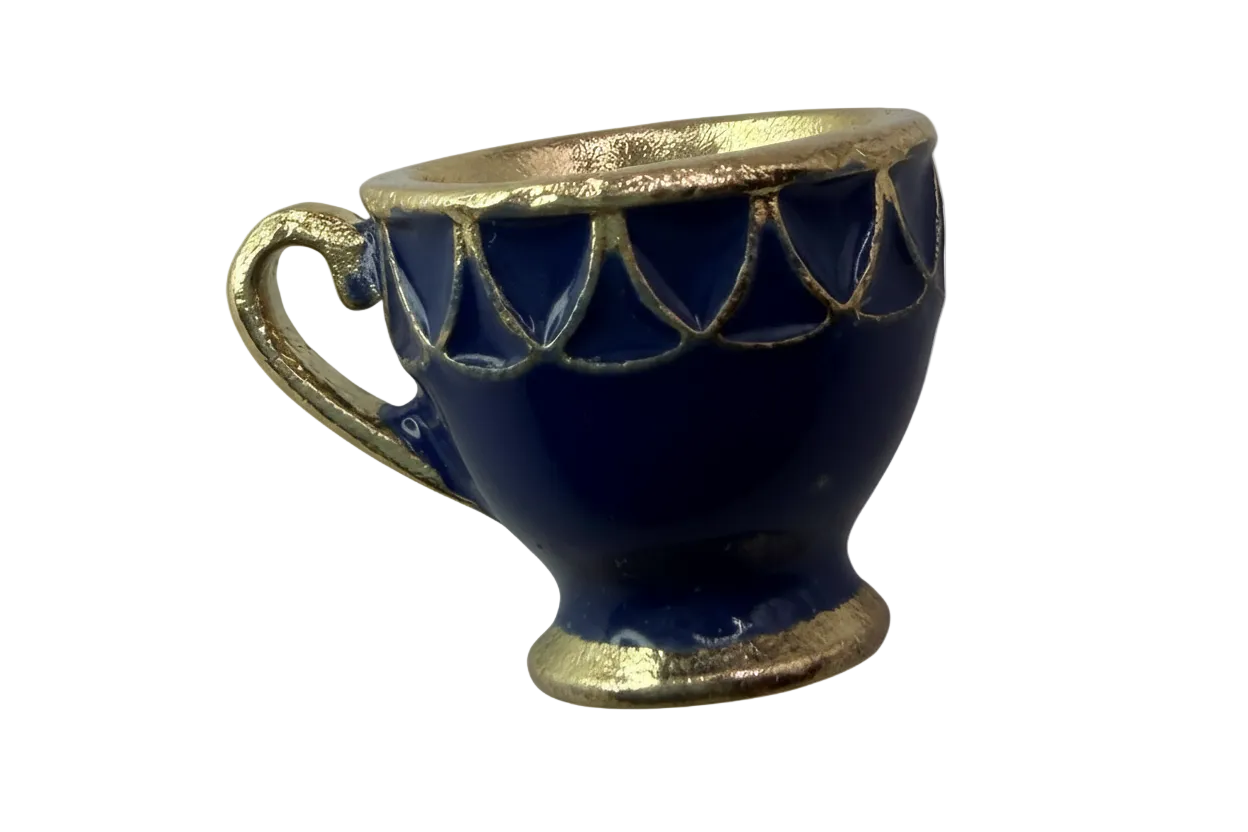 Navy blue enamel teacup with gold rim, base, and handle