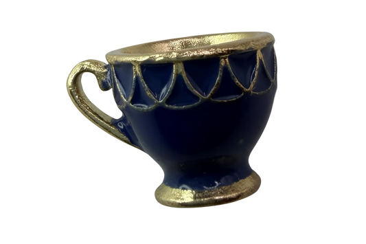 Navy blue enamel teacup with gold rim, base, and handle