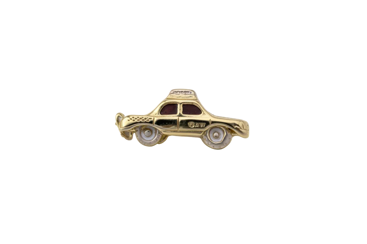 Gold classic car with black windows and white wheels