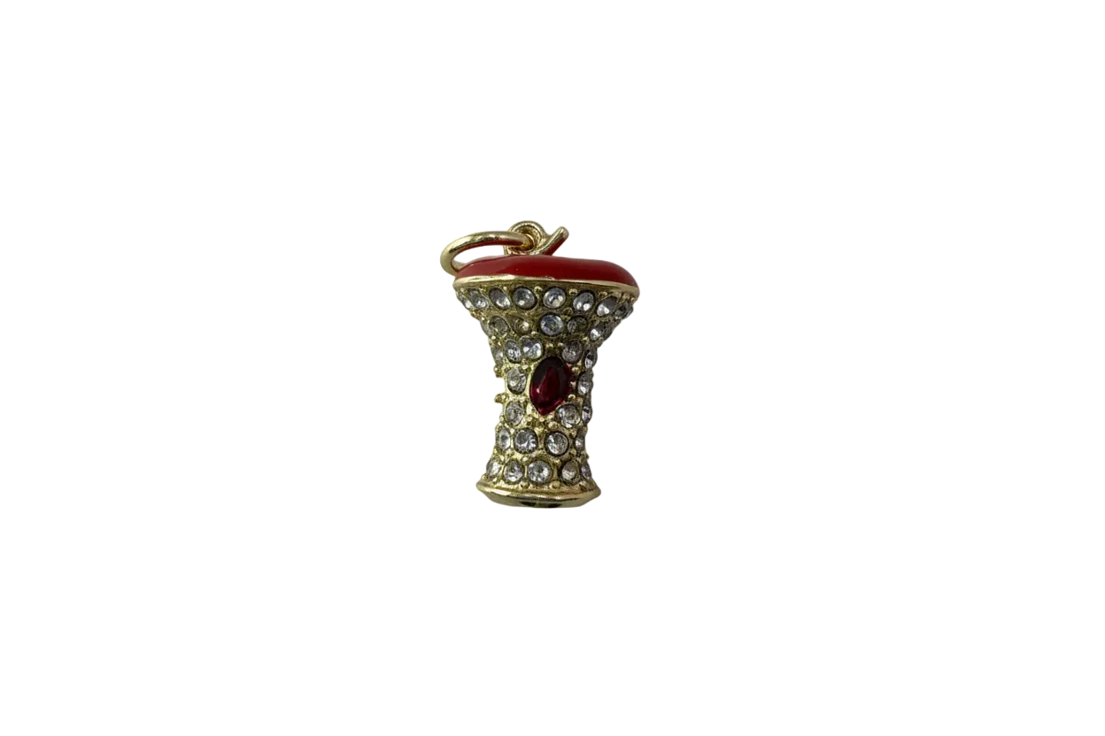 Gold mushroom with red cap, clear crystals, and red gem