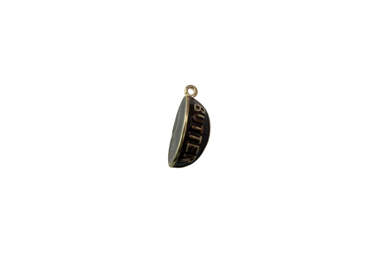 Black crescent with gold BUTTER lettering