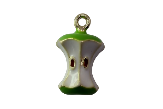 Glossy white apple core charm with green edges and gold outline, brown seed details