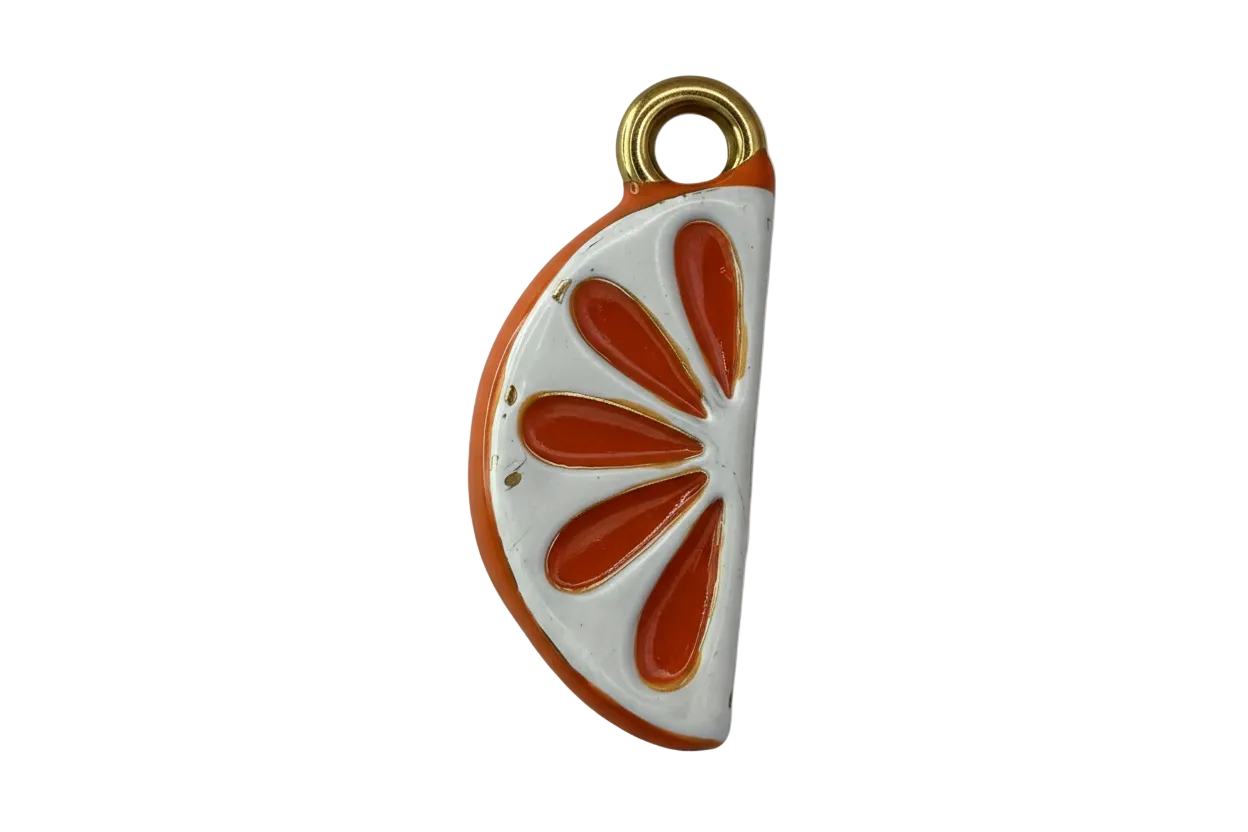 Glossy orange citrus slice with white enamel segments and gold accents