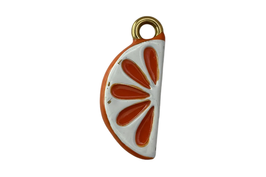 Glossy orange citrus slice with white enamel segments and gold accents
