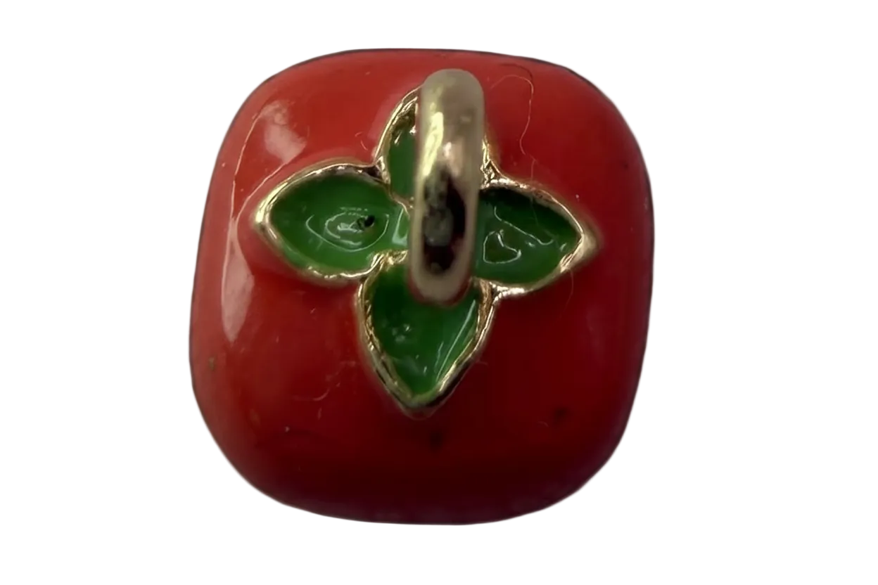 Glossy red apple motif with green leaves and gold outlining