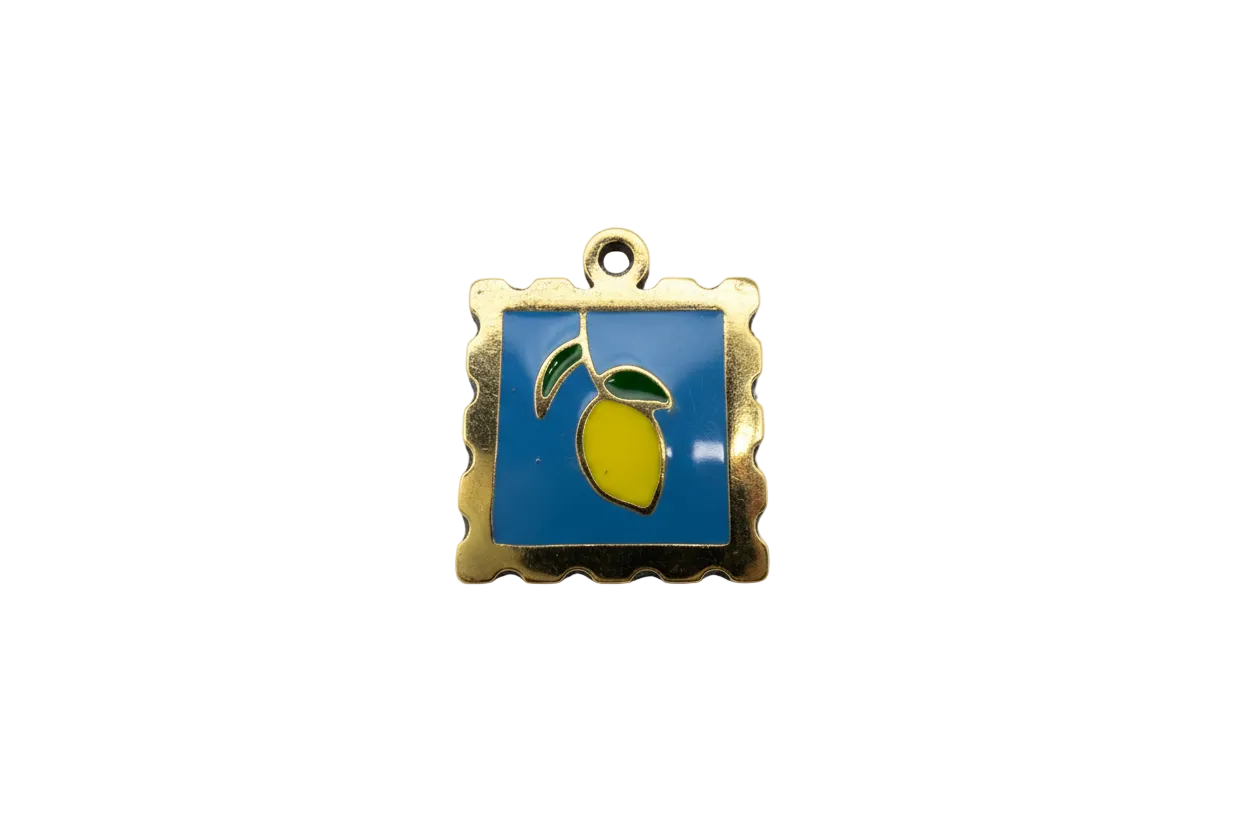 Gold-framed blue tile with lemon and green leaves