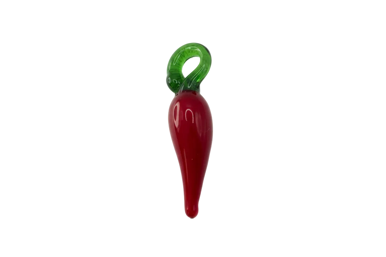 Glossy red chili pepper with green stem
