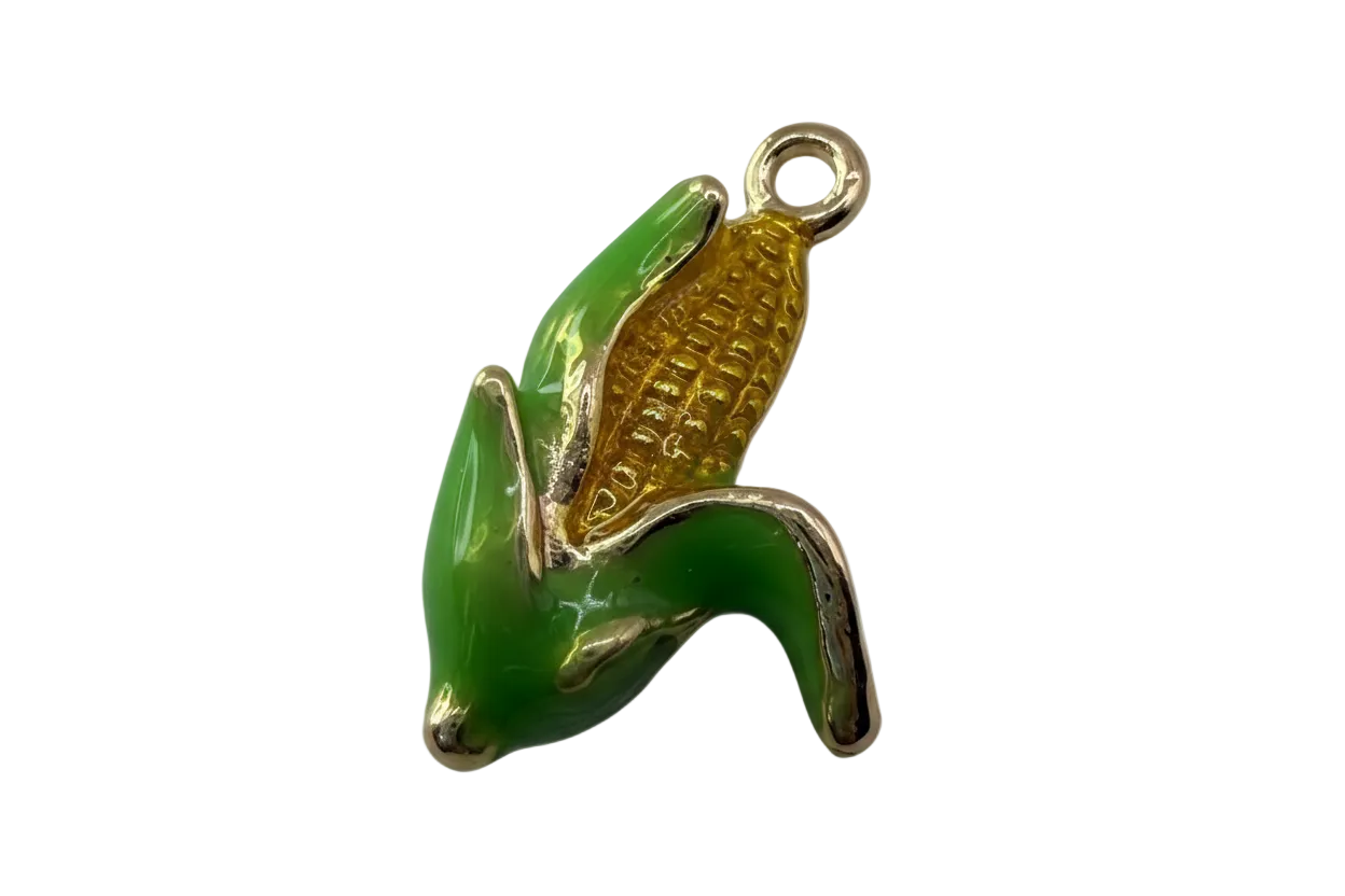Glossy green corn cob charm with golden kernels and silver-tone outline on black background