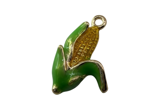 Glossy green corn cob charm with golden kernels and silver-tone outline on black background