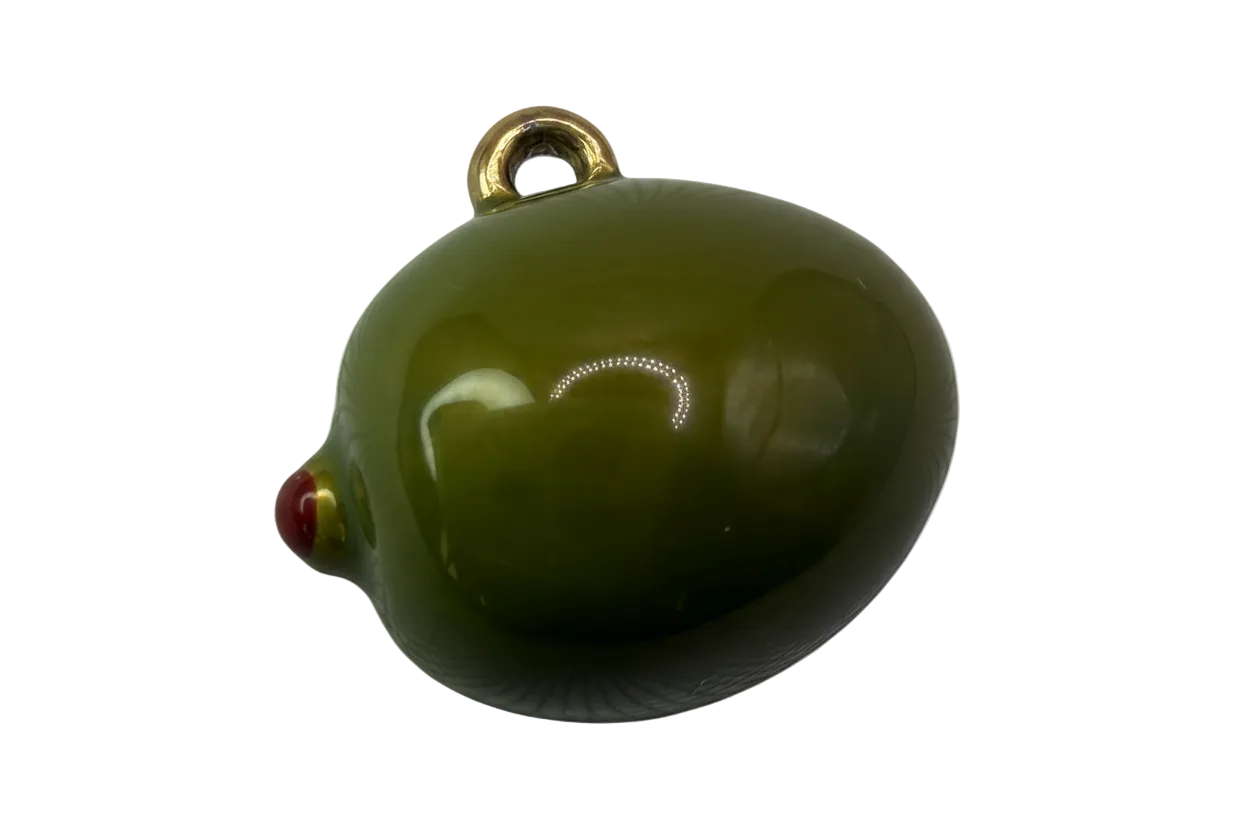 Glossy green olive pendant with red pimento detail and gold accents on black background