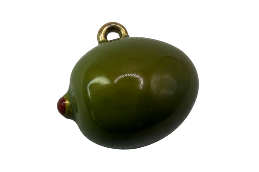 Glossy green olive pendant with red pimento detail and gold accents on black background