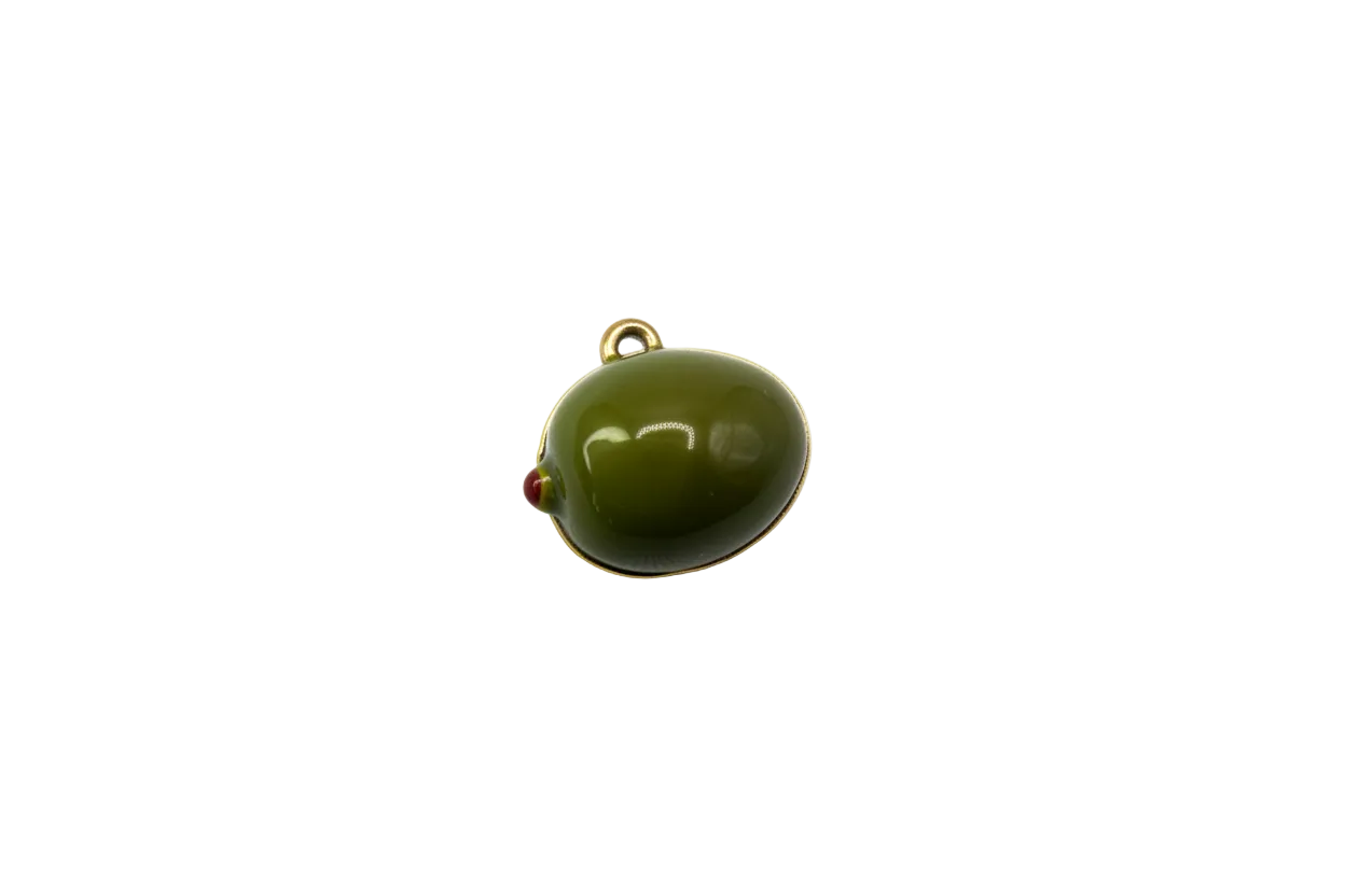 Glossy green olive with red pimento detail and gold accents