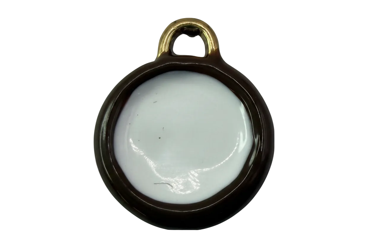 Glossy white enamel round disc framed in polished gold