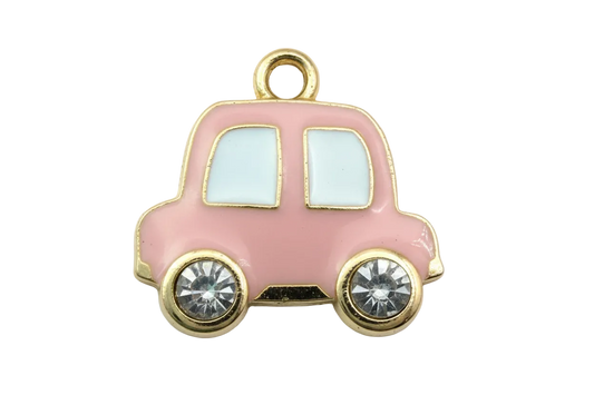 Blush pink enamel car with white windows, gold outline, and clear gem wheels