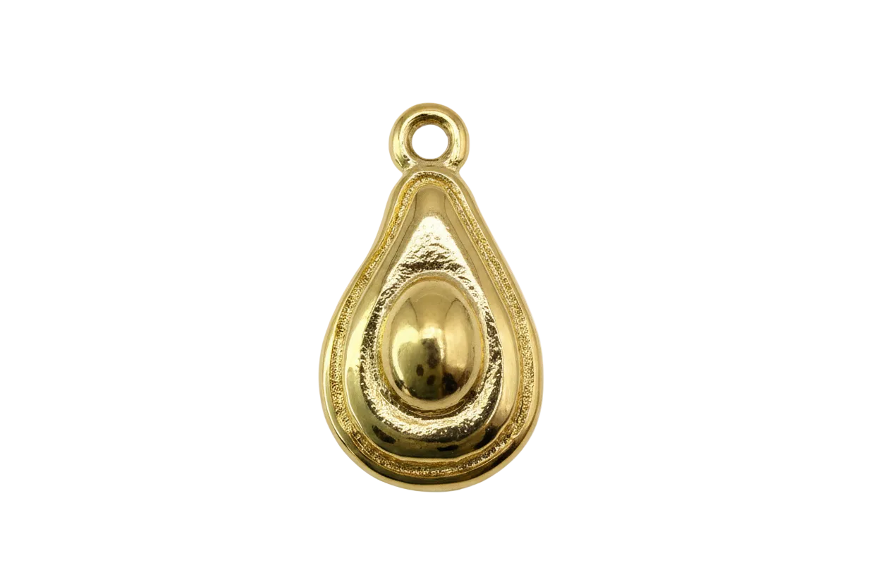 Polished gold avocado half with raised pit detail and textured border