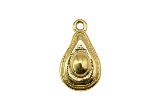 Polished gold avocado half with raised pit detail and textured border
