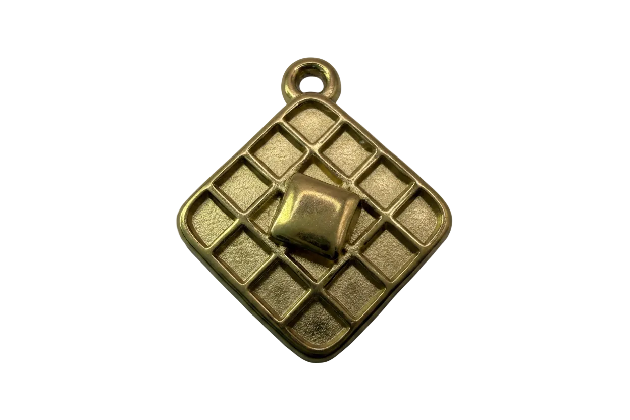 Gold waffle square charm with raised butter cube and grid texture