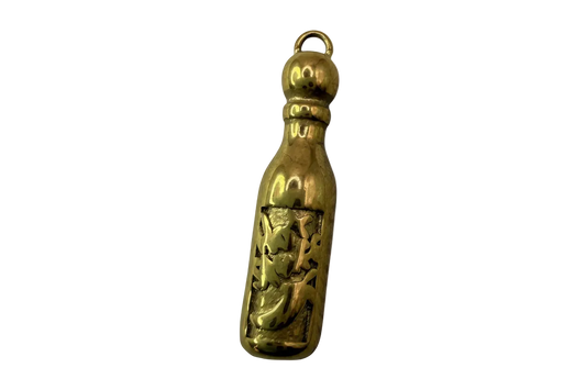Polished gold bottle charm with cutout crescent moon and stars