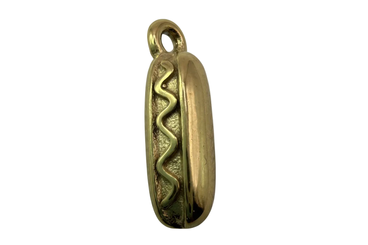 Gold hot dog pendant with raised wavy mustard line detail