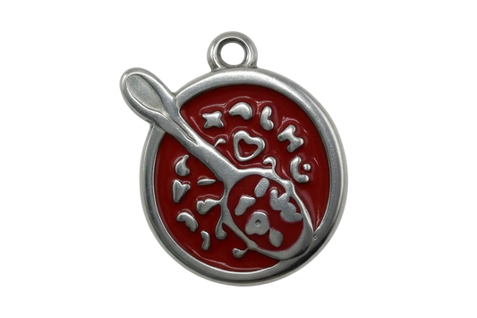 Red enamel soup bowl with spoon design and raised silver-tone details