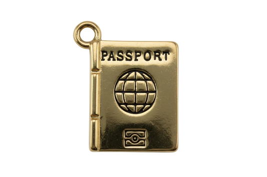 Gold passport book charm with embossed PASSPORT text and black globe emblem