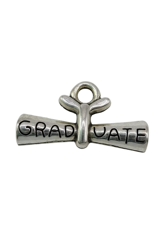 Polished silver cross with engraved “GRADUATE” lettering and oxidized details
