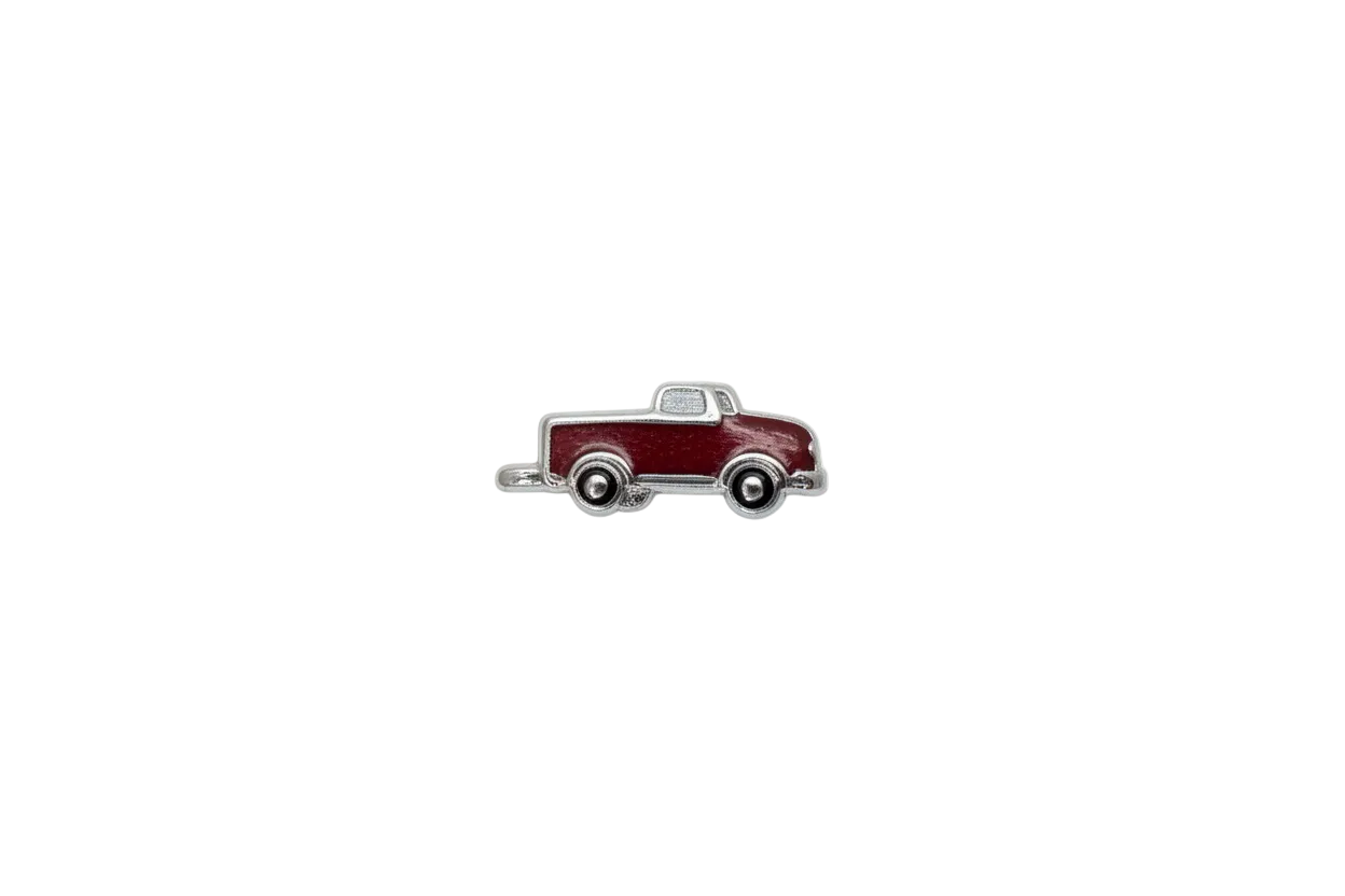 Red enamel pickup truck with silver-tone trim and black wheels