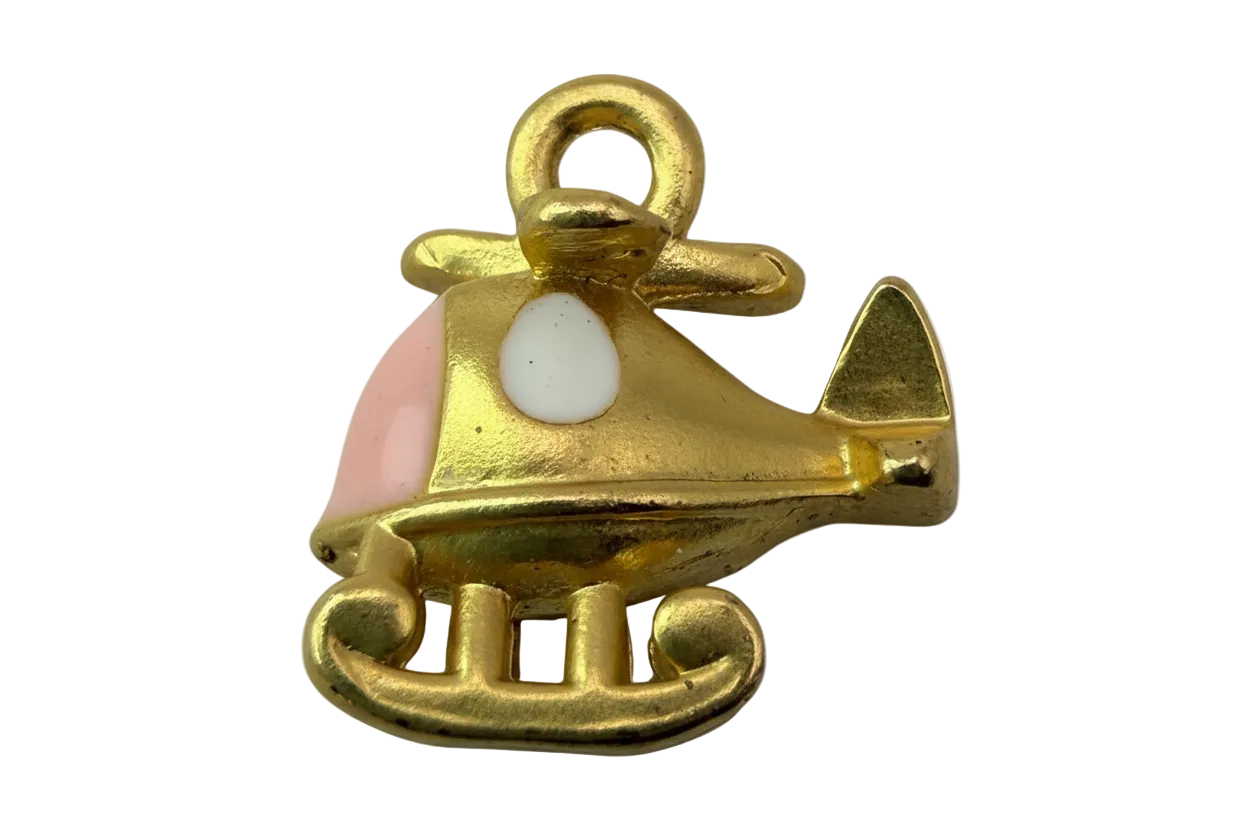 Gold ice skate charm with blush pink toe and white enamel detail