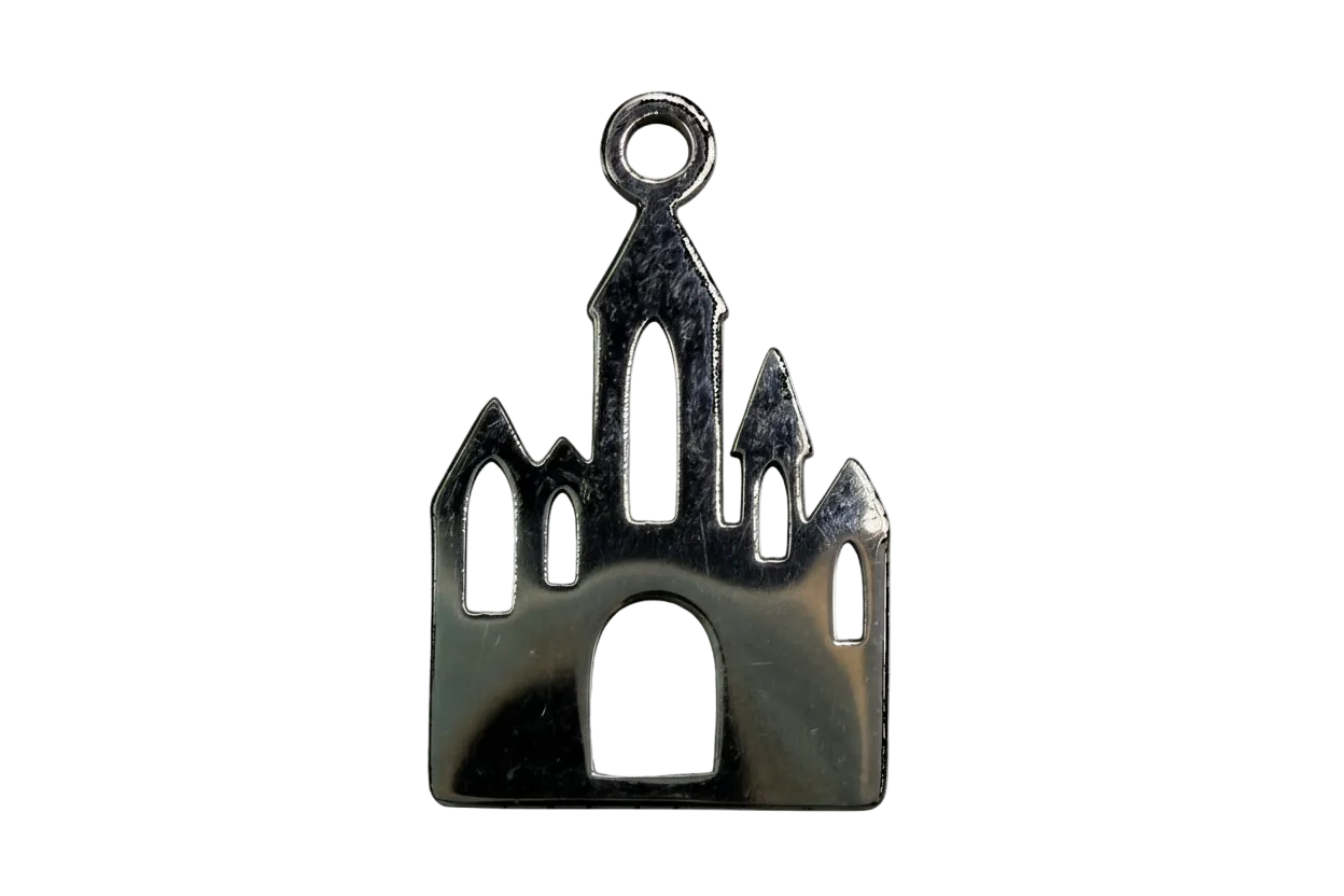 Polished silver-tone gothic castle silhouette with arched window cutouts