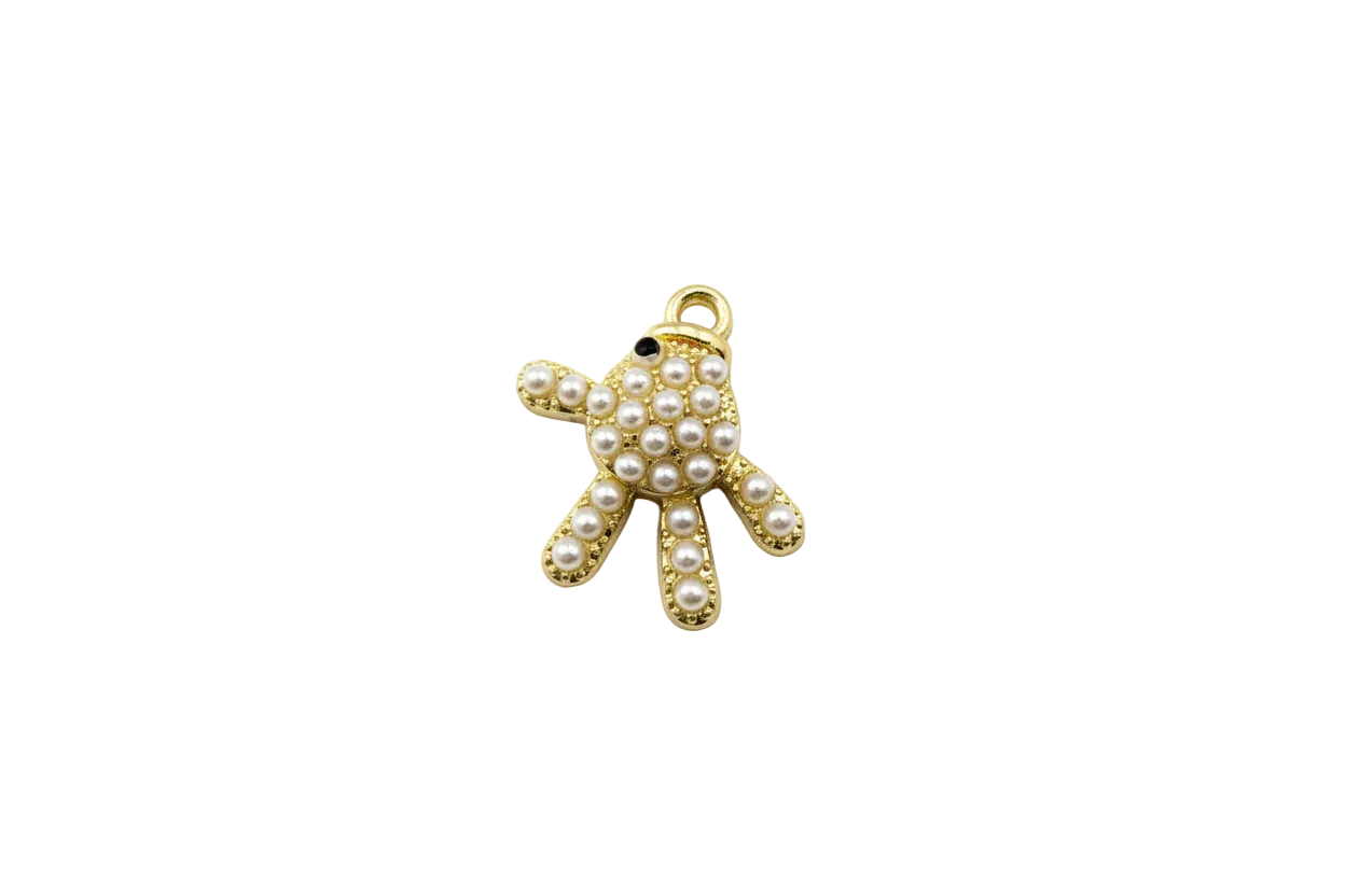 Gold teddy bear with pearl-like bead accents