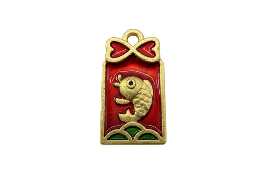 Gold koi fish on a red enamel rectangular plaque with green accent and bow-like top detail
