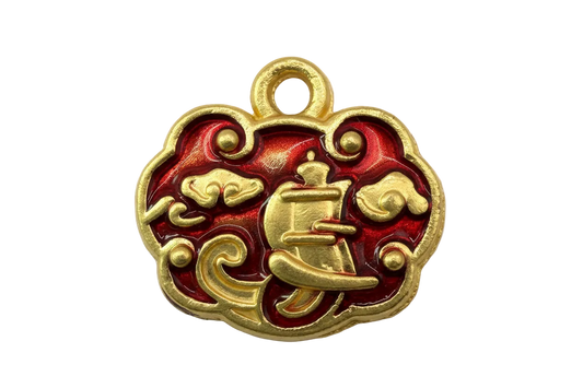 Gold cloud-shaped piece with crimson enamel and raised sailing ship and wave details