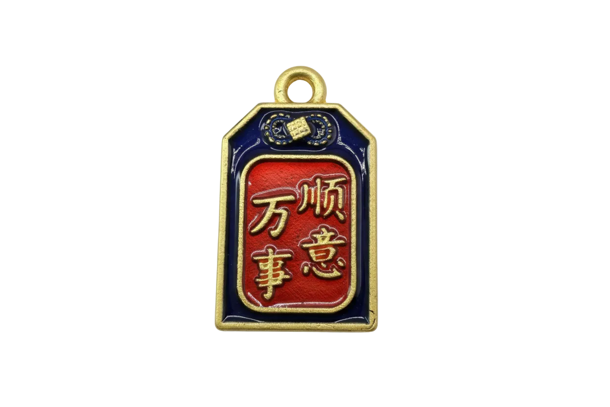 Gold-framed navy and red enamel amulet tag with raised script symbols