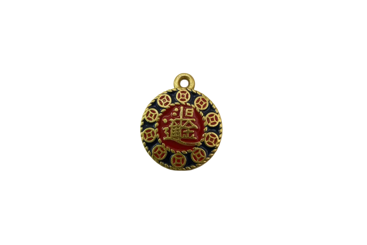 Gold fortune coin medallion with red center and black border