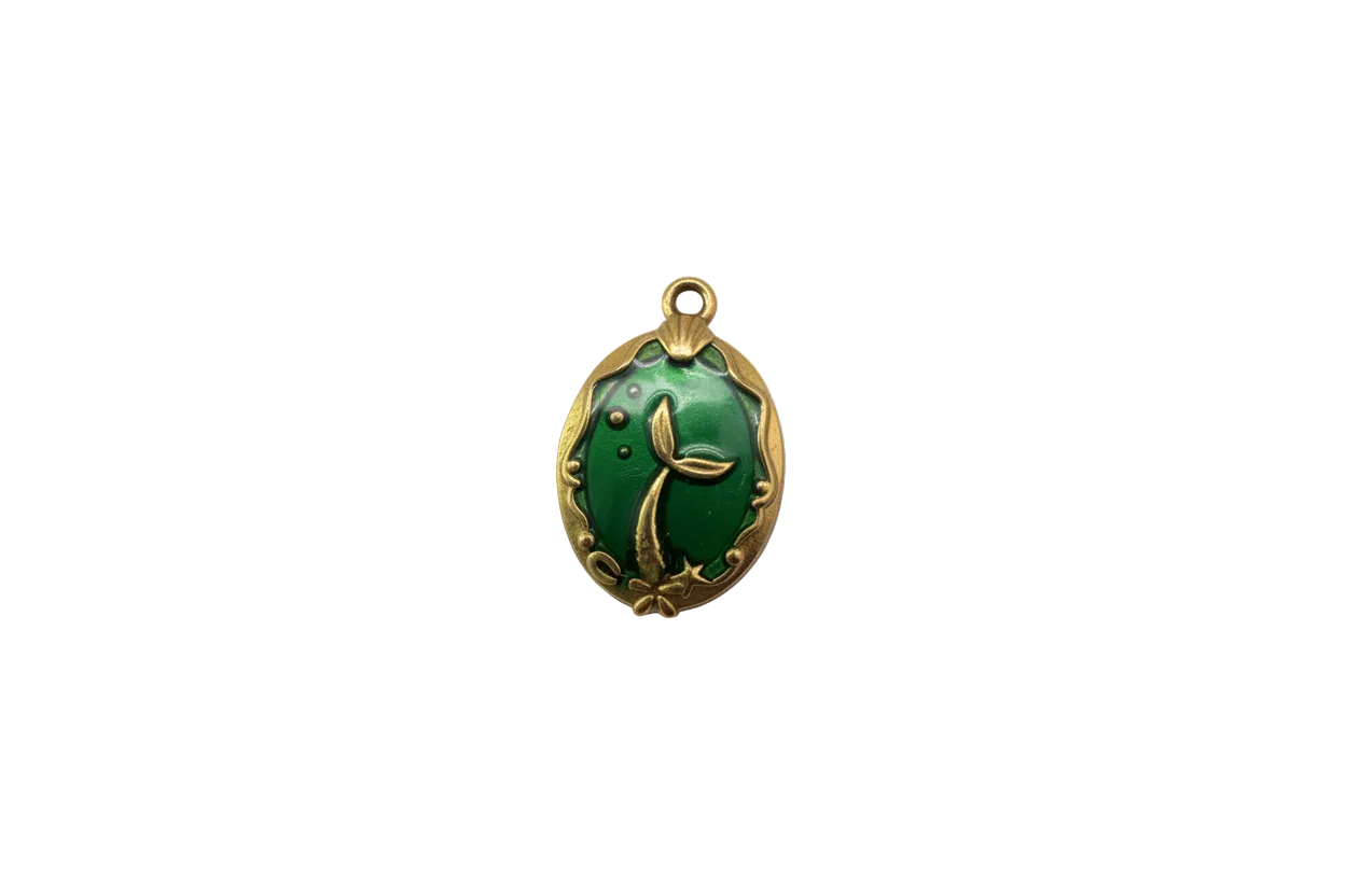 Gold oval with green enamel and raised mermaid tail motif