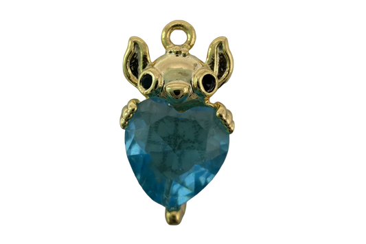 Polished gold mouse holding a faceted blue heart gem with black eyes