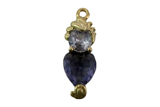 Gold heart charm with faceted violet heart gem and small clear round gem accent