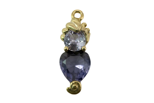 Gold-finish two-stone piece with faceted violet heart crystal and pale lavender round crystal