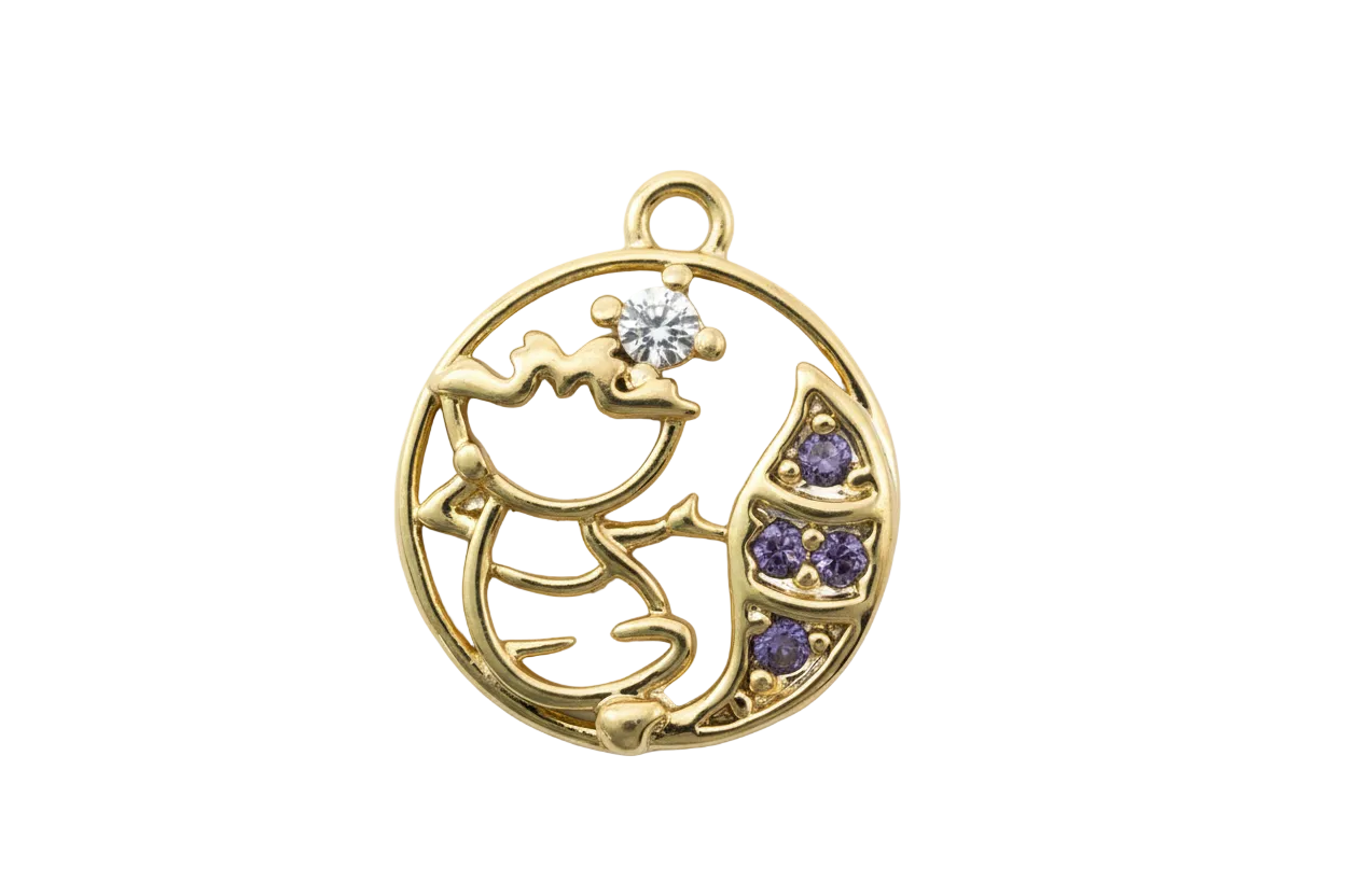 Gold cat and crescent moon coin with violet gems and a clear gem on an ivory patterned center