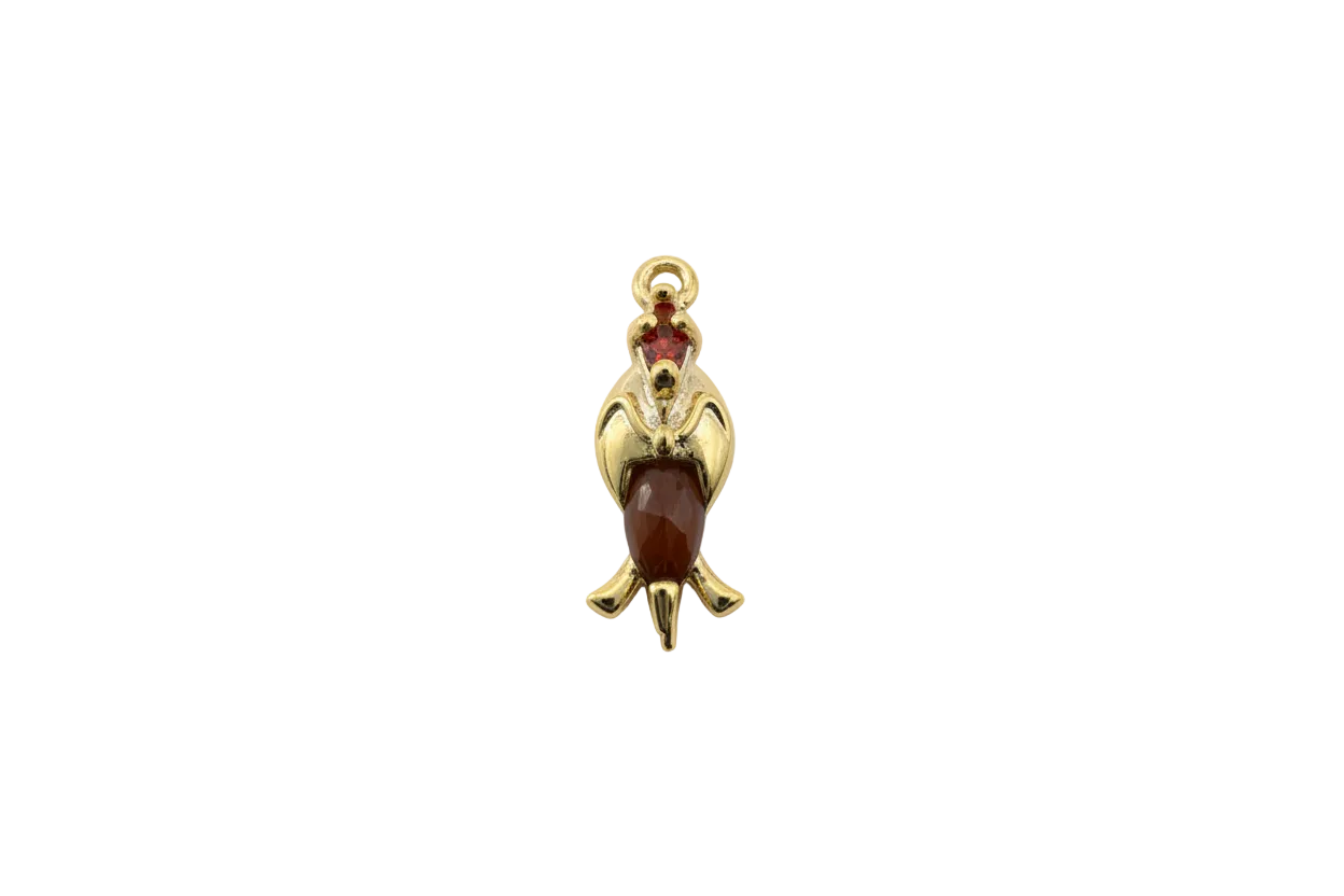 Gold penguin charm with amber crystal and red accent