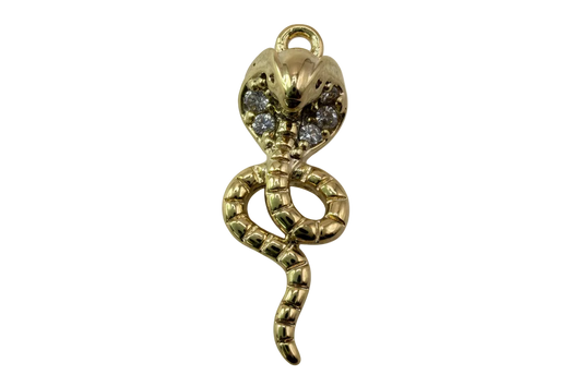 Gold coiled cobra snake charm with clear crystal accents and glossy finish