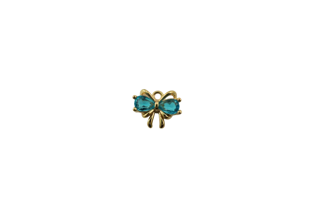 Gold bow knot with faceted aqua-blue gems