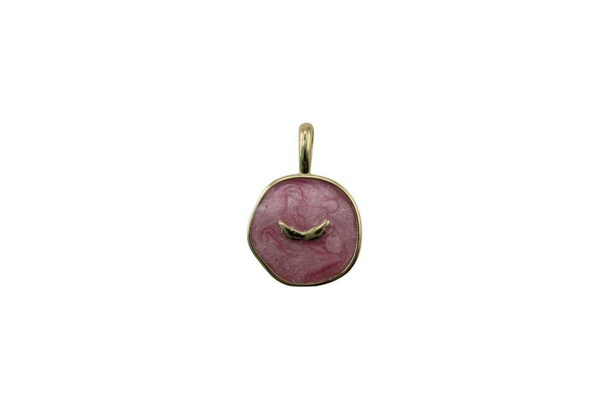 Pink marbled round disc with gold border and center bar