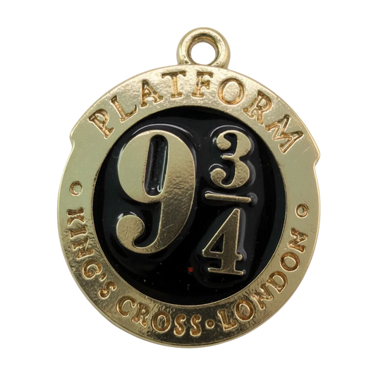 Round gold medallion with glossy black enamel and raised 9 3/4 rail platform design