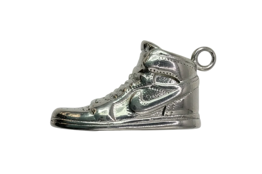 Polished silver high-top sneaker charm with sculpted laces and panel detailing
