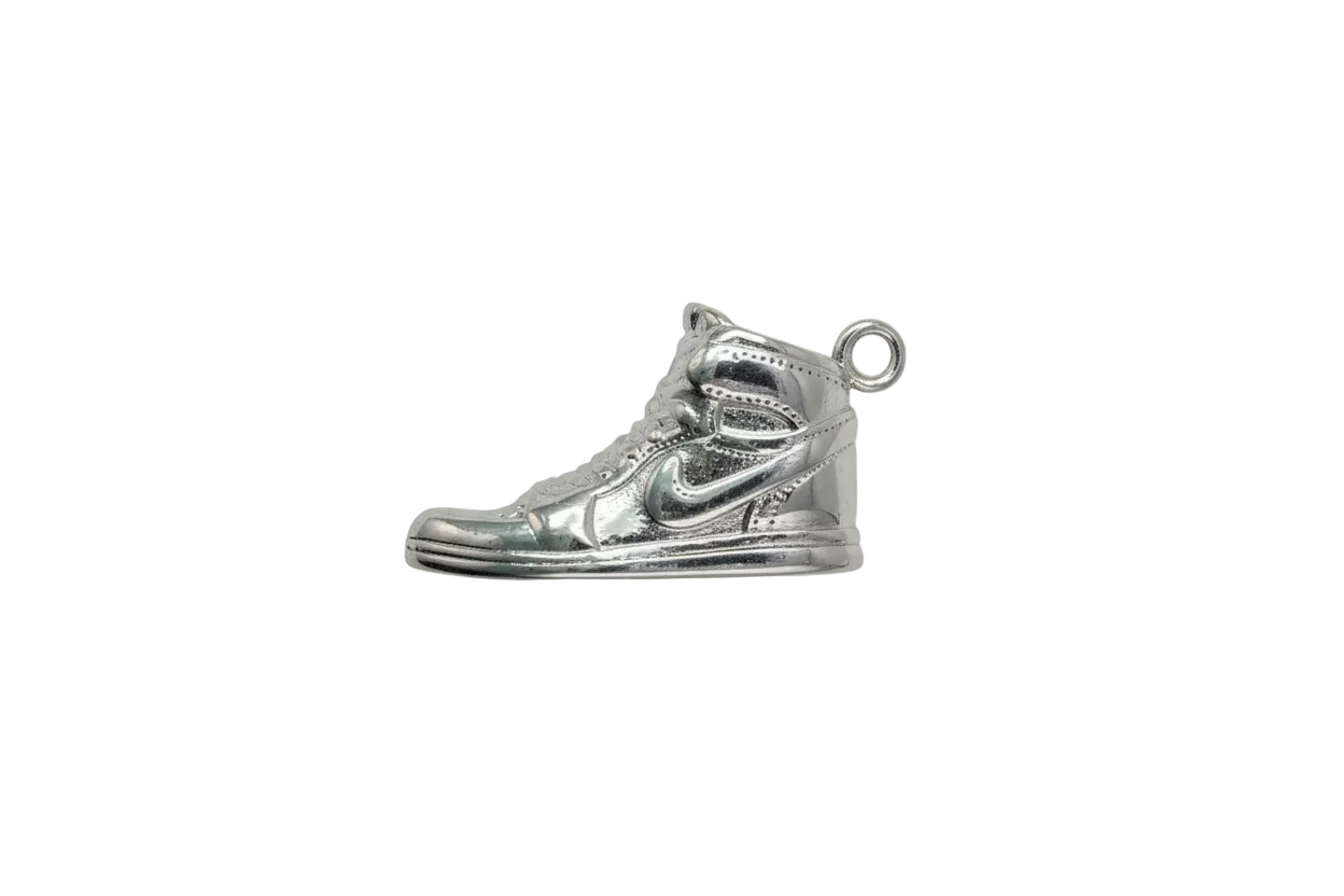 Silver high-top sneaker charm with sculpted laces