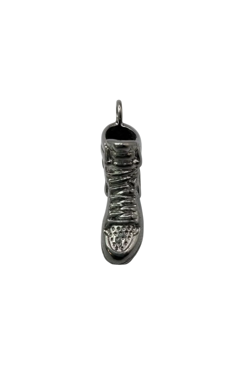 Silver sneaker pendant with textured laces and tread
