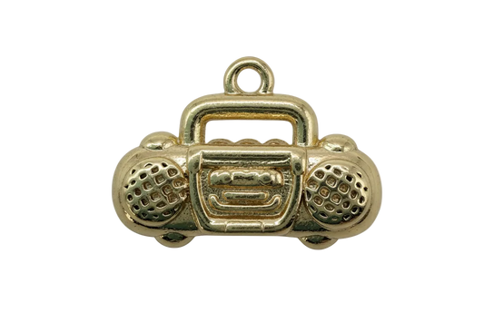 Polished gold boombox charm with textured speaker grills