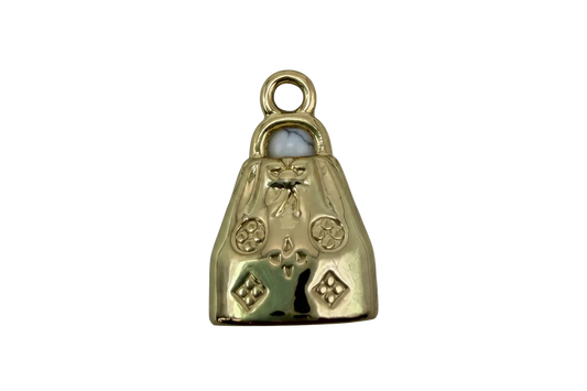 Polished gold handbag pendant with sculpted bow and stud details