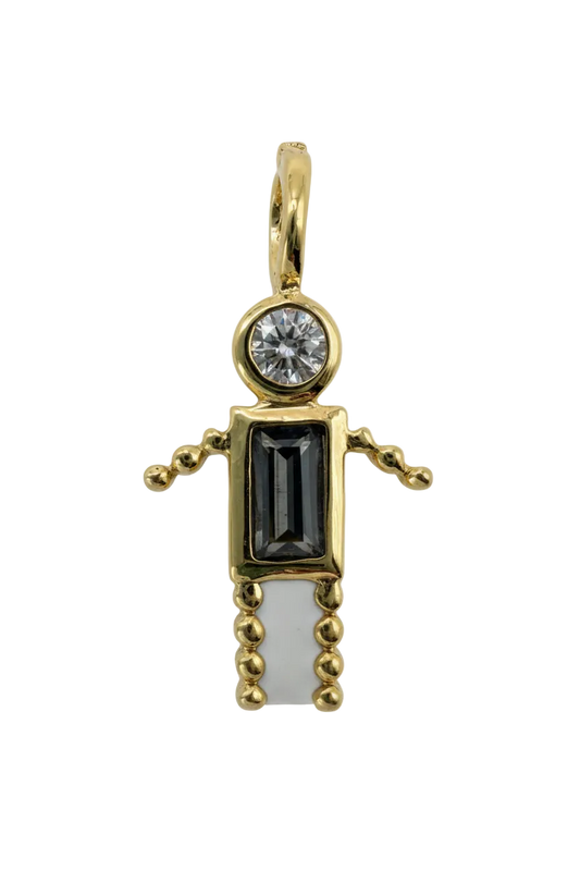 Gold pistol charm with skull details, black rectangular inlay, and clear round gem